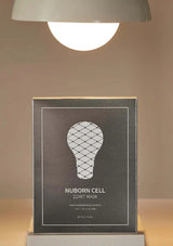 Product packaging with a light bulb design on a neutral background