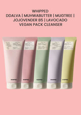 Five tubes of 'Whipped' vegan pack cleanser on a pink background with product names listed.