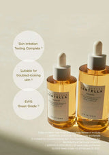 Two bottles of Centella Arnica skincare product with droppers on a light background.