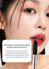 Close-up of a person applying pink lipstick with a text overlay about translucent coloring.