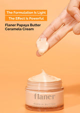 Flaner Papaya Butter Ceramela Cream with a hand applying cream on an orange background