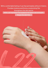 Hand applying a cream to wrist with text on a red background