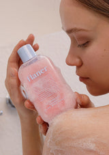 Product description text with a strawberry sorbet texture and white strawberry water focus on moisturizing and exfoliating skin.