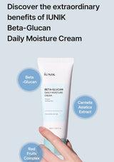 IUNIK Beta-Glucan Daily Moisture Cream with hand holding it against a light blue background