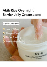 A jar of Abib Rice Overnight Barrier Jelly Cream shown with a hand dipping a finger into the gel. The image includes marketing text highlighting benefits for Korean glass skin, such as non-irritating, allergen free, and barrier boosting.