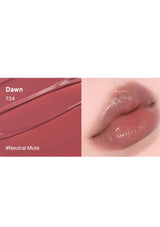 Lipstick shade 734 'Dawn' shown on a swatch and applied to lips.