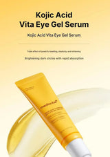 MediLabs Kojic Acid Vita Eye Gel Serum in a yellow squeeze tube with a white cap, set against a soft yellow background with text describing its brightening and anti-dark-circle benefits.