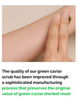 Close-up of a hand holding a green caviar scrub with text about product quality and manufacturing process.