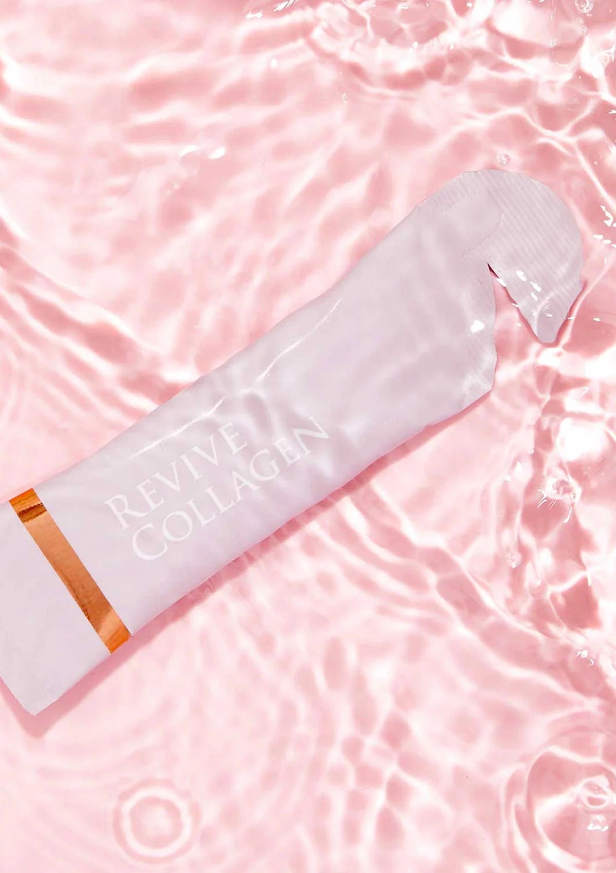 Revive Collagen product on a pink water background