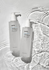 Two bottles of Revectin Gentle Cleansing Gel on a water surface
