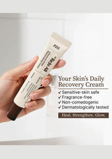Hand holding a tube of 'Your Skin's Daily Recovery Cream' with product details on a white background