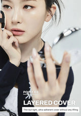 Woman applying makeup with a close-up of her hand and face, featuring text about layered cover.