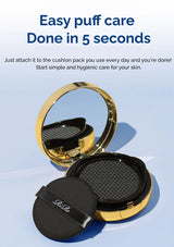 Compact makeup puff with gold and black design on a light blue background