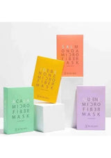 Four boxes of microfiber masks in different colors on a white background