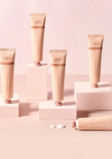 Nuborn Cell skincare products on a pink background