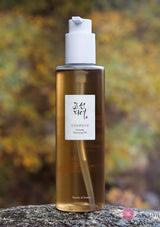 Skincare bottle with a label on a natural background