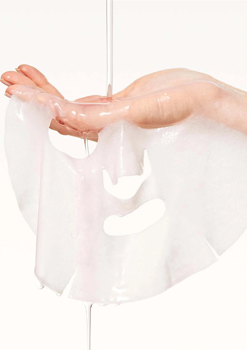 Clear gelatinous material being stretched between two hands on a white background