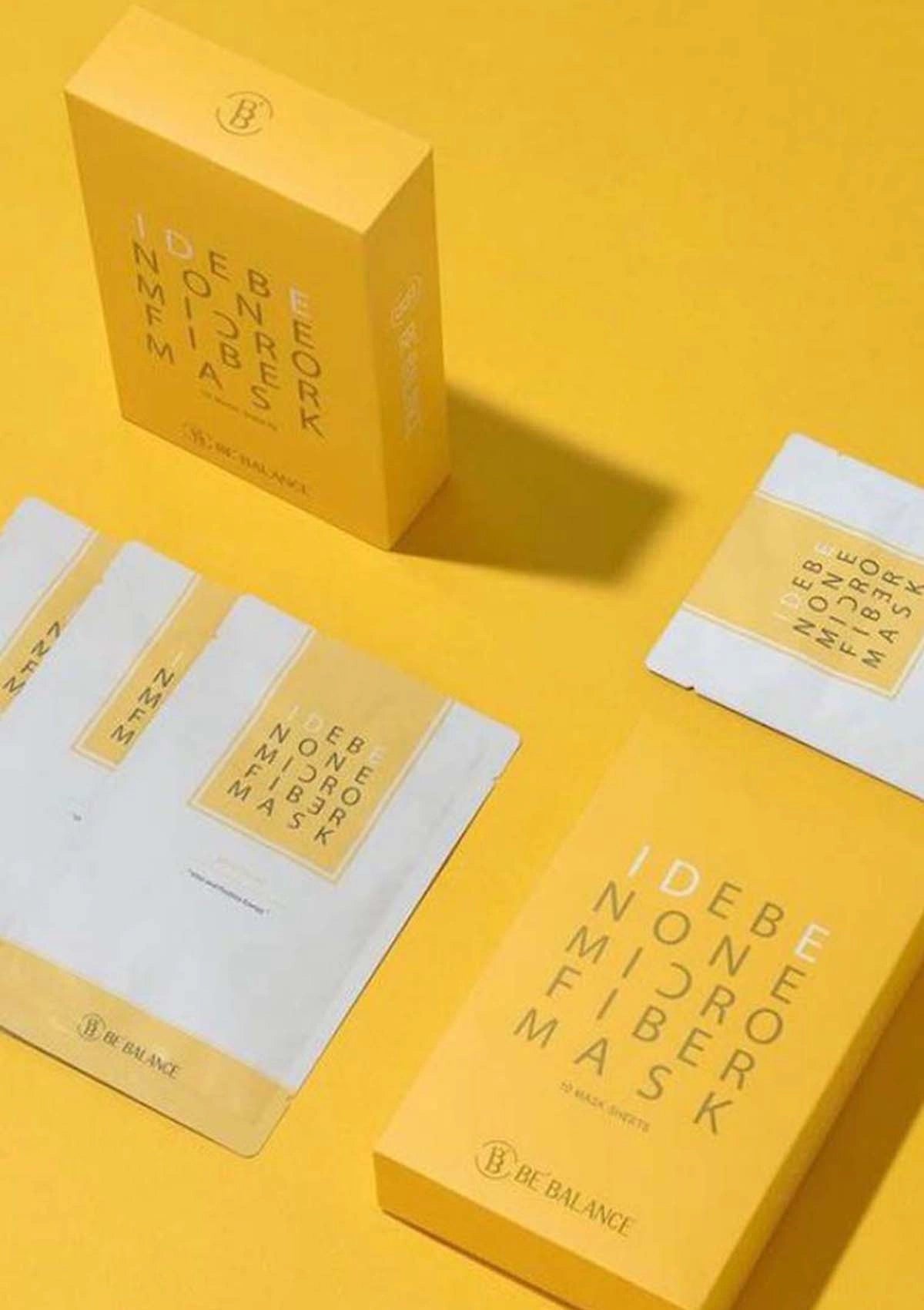IDEBE NONE MICRO FIBER MASK packaging on a yellow background