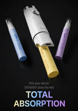 Three cosmetic serum tubes in blue, yellow, and purple are arranged around a white handheld device on a black background, with promotional text reading 'Pick your serum, SKINIMAX does the rest, TOTAL ABSORPTION'.