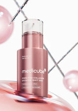 Pink skincare serum bottle with 'medicube' branding on a white background