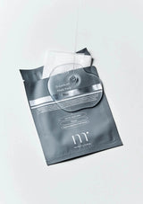 Dr. Dennis Gross skincare mask pack on a white background