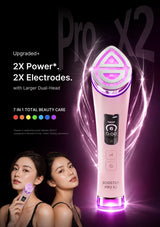 A beauty device labeled 'BOOSTER PRO X2' shown prominently on a dark promotional background, with two women at lower left holding or using the device. The ad text highlights '2X Power', '2X Electrodes', and '7 in 1 total beauty care'.