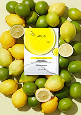 Anua skincare mask box surrounded by lemons and limes on a light background