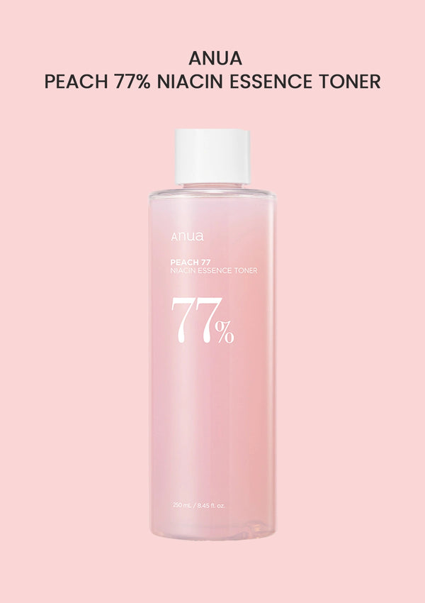 Pink bottle of ANUA Peach 77% Niacin Essence Toner on a pink background