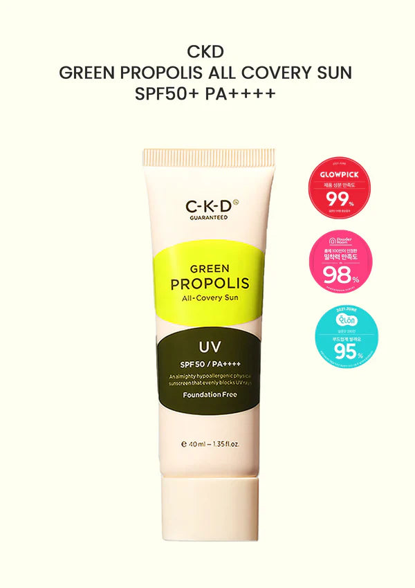 C-K-D Green Propolis All-Covery Sun SPF50+ PA++++ sunscreen tube centered on a light cream background, with three circular red, pink, and blue certification-style badges on the right and product text at the top.