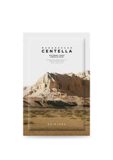 Product packaging with a desert landscape and 'Skinfood' branding