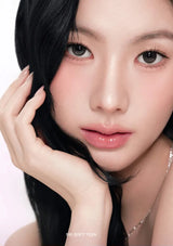 Close-up of a person with black hair and pink lipstick on a white background