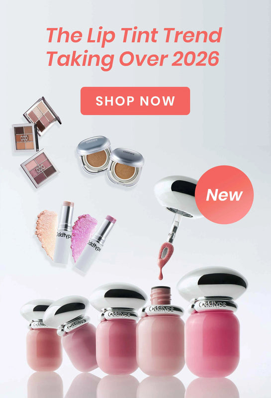 Makeup products including lipsticks and lip glosses with a 'Shop Now' button on a light gray background.