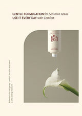 Cosmetic bottle with dropper labeled 'up pod' on a beige background with a white flower.