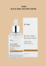 IUNIK Black Snail Restore Serum product with light yellow background