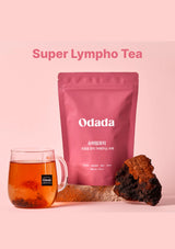 Odada Super Lympho Tea package with a glass of tea and a piece of brown root on a pink background