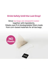 Tea bag with Odada label on a white background, promoting biodegradable filters.