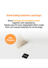 Tea bag with Odada label and bio-degradable filter on a white background
