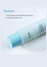 Skincare product with blue cap and white body on a light background