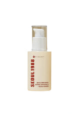 Skincare serum bottle with 'Seoul 1988' text on a white background
