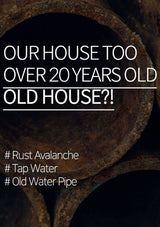 Rust-covered metal pipes with text about old houses and water issues.