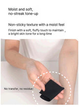 Person holding a black makeup product with text describing its features on a white background