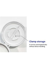 Clamp storage feature with text indicating hygienic usage.