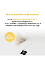 Tea bag with Odada label on a white background, featuring text about PLA bio-degradable filters.