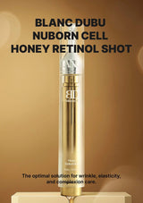 Gold bottle of Blanc Dubu Nuborn Cell Honey Retinol Shot on a beige background