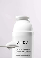 AIDA Ultra Barrier Ampoule Cream bottle on a light gray background