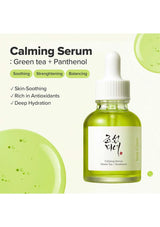 Calming serum bottle with green tea and panthenol on a light green background