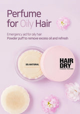 Hair dry powder perfume packaging with puff and flowers on a pink background