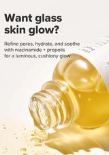 Bottle of skincare product with text about refining pores, hydrating, and soothing skin.