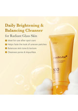 Orange tube of Medicube Daily Brightening & Balancing Cleanser on a yellow background