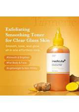 Medicube exfoliating smoothing toner bottle with turmeric root on a yellow background